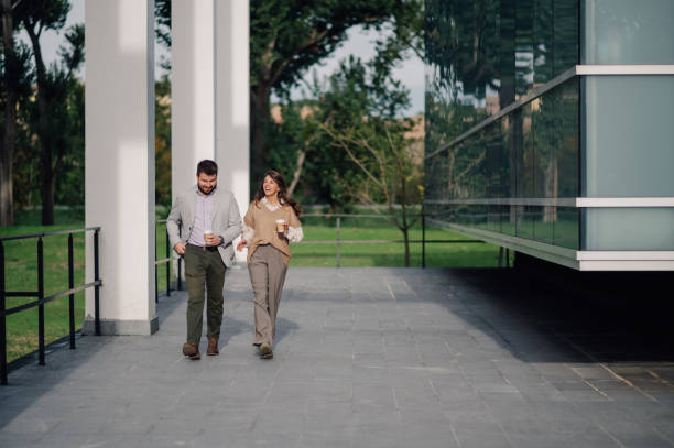 istock Business people walking and talking during coffee break 2198786167
