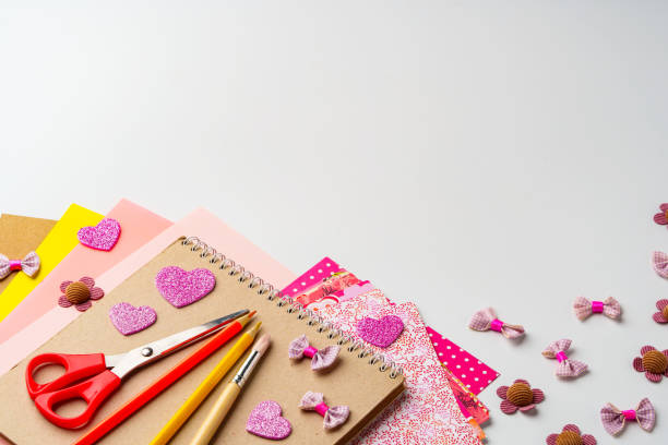 istock Crafting supplies and materials arranged for creative projects on a tabletop in a bright and inviting workspace 2198787639
