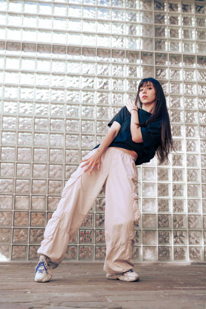 istock Dance performance with expressive movements in urban space highlighting skill and style at an indoor location 2198787654