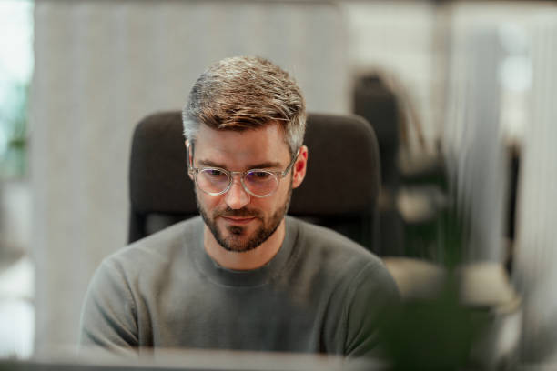 istock Modern Businessman Working in Contemporary Office Space 2198794399