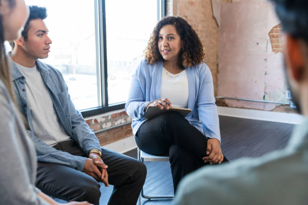 istock Group Therapy Session: Diverse People Discussing Mental Health 2198798465