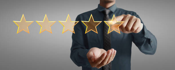 istock Rise on increasing five stars in human hand 2198798650