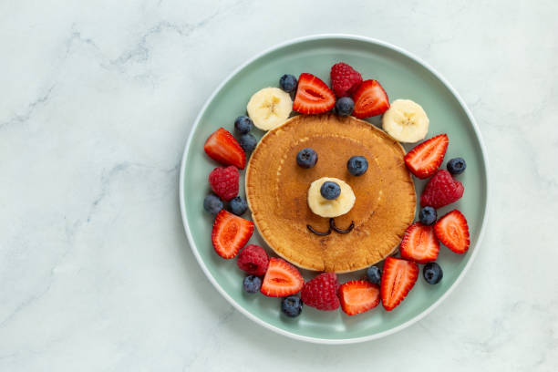 istock Funny kids breakfast, bear face pancakes 2198798967