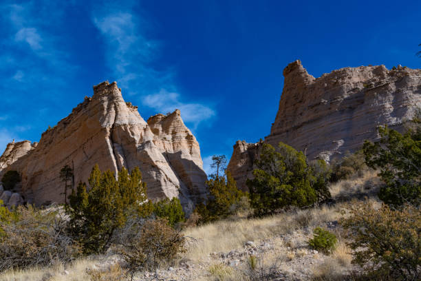 The unique hoodoos that form the main attraction at Kasha-Katuwe Tent Rocks National Park, outside of Albuquerque, New Mexico.  This particular morning was unseasonably cold, which resulted in almost no one being in the park.  It also allowed the snow from the week before to remain.
