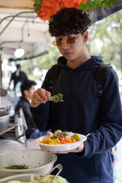 Lunching at a Street Food Stall stock photo