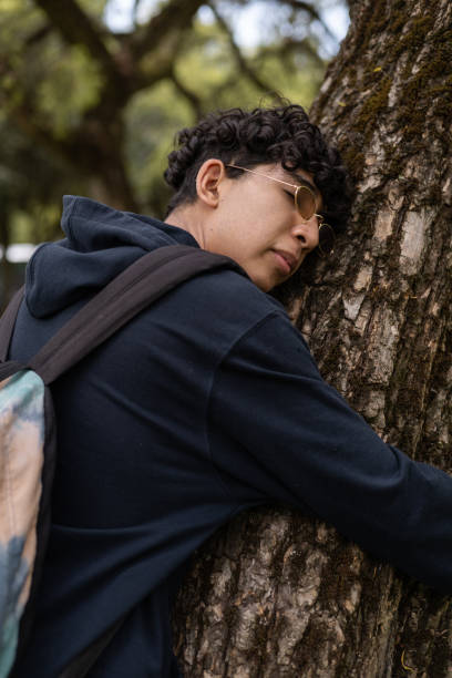 istock Young Person's Moment of Connection with Nature 2198804624
