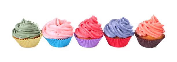 istock Different tasty cupcakes with cream isolated on white 2198805455
