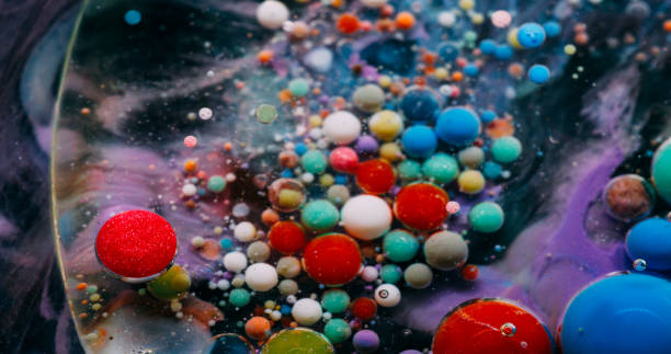 istock Bubble spill ink oil color drops explosion water 2198811657