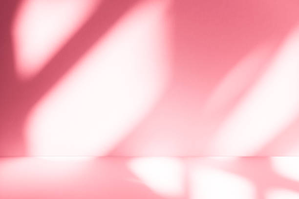 istock Wall interior background, studio, and backdrops show products. with shadow from window color white and pink light. background for text insertion and presentation of product 2198815649