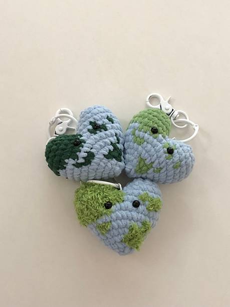istock Handmade crochet keychain with intricate stitching and a soft, textured design. A cute and stylish accessory, perfect for adding a personal touch to your keys or bag. 2198816368