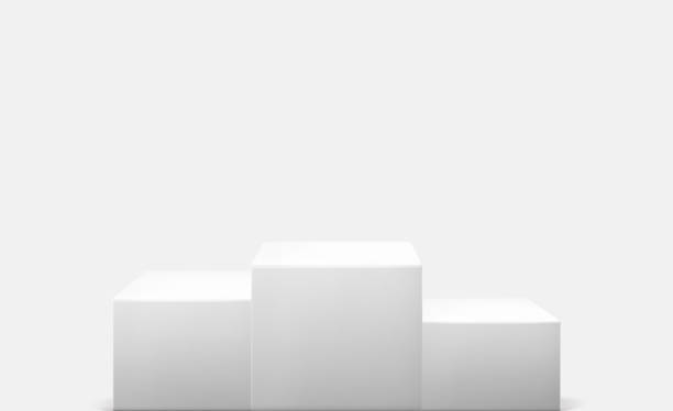istock White product display podium in studio room, for display presentation. 2198817517