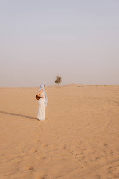 istock Girl in a Desert 2198823208