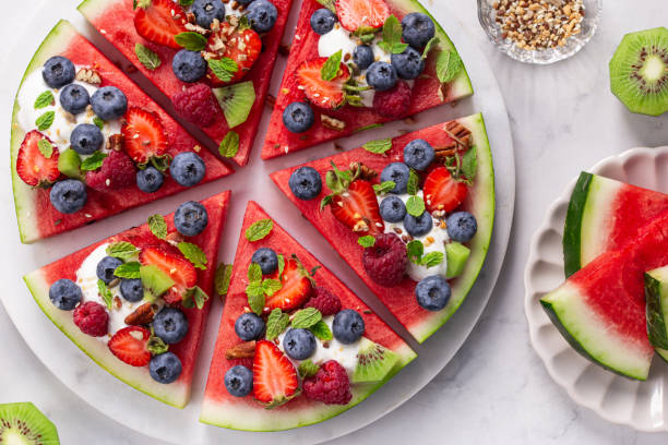 istock watermelon pizza with yogurt and fresh berries, 2198826530