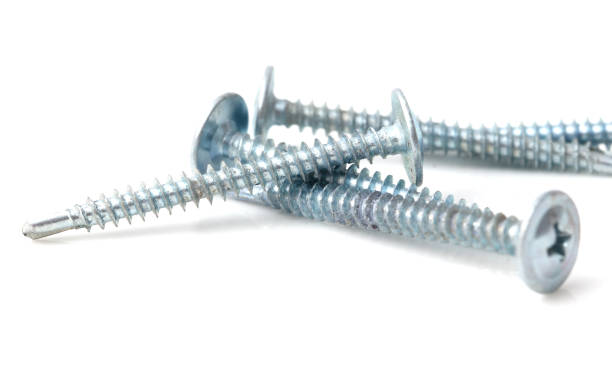 istock A row of four screws with a pointed top 2198827325
