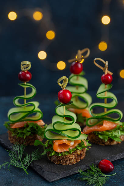 Smoked salmon and  Cucumber Christmas trees canapes