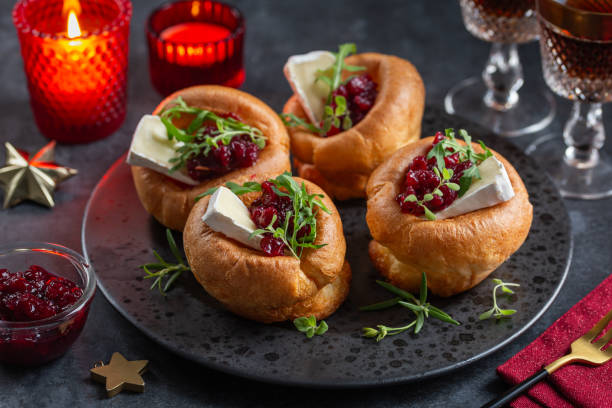Yorkshire puddings with brie cheese and cranberry jam