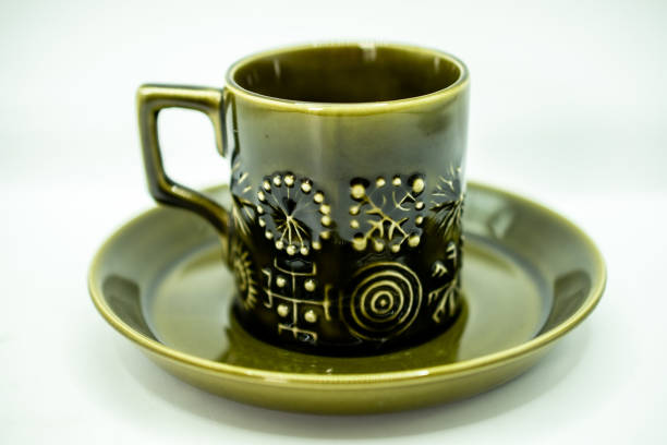 antique porcelain pieces photographed on a white background
