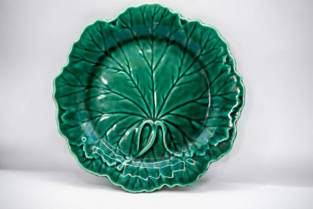 antique porcelain pieces photographed on a white background