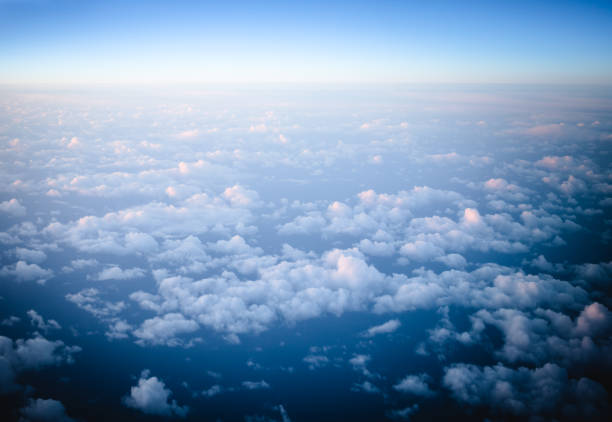 istock Aerial view of clouds from an airplane at high altitude 2198831987