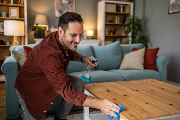 istock Man doing housework, cleaning his living space 2198833844