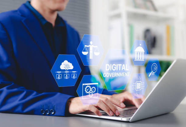 istock Digital government and E-governance concept. Businessman using laptop with icons e-governance, cloud computing, legal balance, government institutions, security infrastructure, online administration, 2198837421