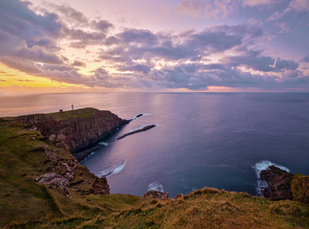 istock View of the Akraberg Lighthouse on Faroe Islands at sunset. 2198837628