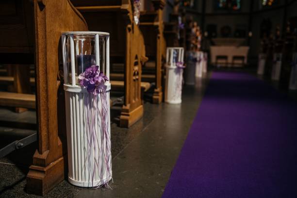 istock Church Aisle with Purple Decor 2198840593