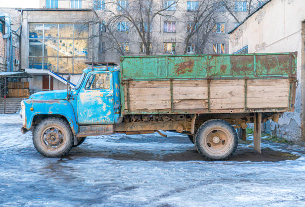 istock Rusty Old Truck in Urban Winter Setting 2198840611