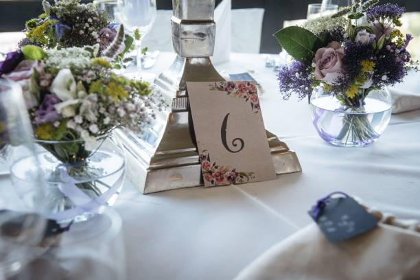 istock Elegant wedding reception table with floral centerpieces 2198840689