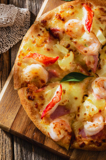istock pizza on wooden background 2198840854