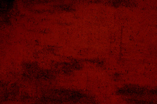 An abstract dark red textured surface featuring a vintage and rugged appearance, suitable for backgrounds, digital assets, or design projects where an intense and bold tone is desired.