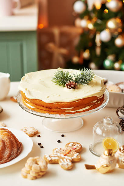 istock Christmas cake and sweets on table. Christmas decorations with lights background. Happy New Year! Christmas greeting card. Winter card template. Xmas concept. Holiday Banner. Feast of Nativity. 2198844844