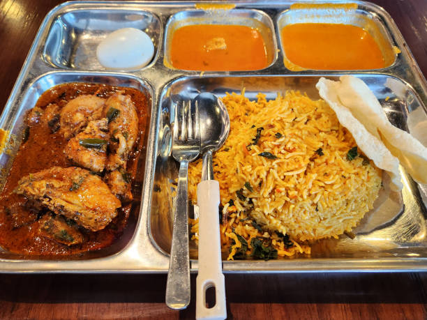 A close-up photo of a Chicken Biryani meal.