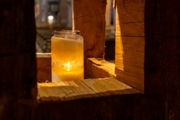 istock Candlelight illuminating rustic wooden structure in cozy indoor setting during evening hours 2198846348