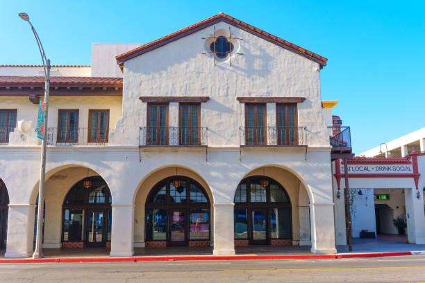 Riverside, California - December 31, 2024: Elegant view of a historic Riverside Fox Theater showcasing arched windows and traditional architecture against a clear blue sky.
