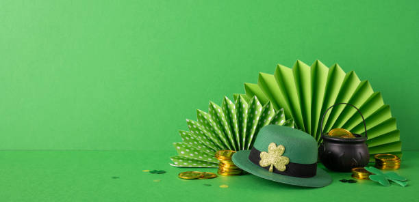istock Festive elements for celebrating St. Patrick's Day, including green decorations, a festive hat, and gold coins on a vibrant green background 2198847670