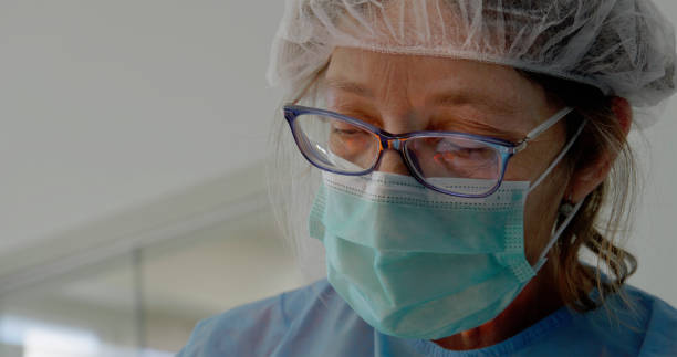 istock Experienced Veterinarian Performing Surgery on a Cat 2198847938