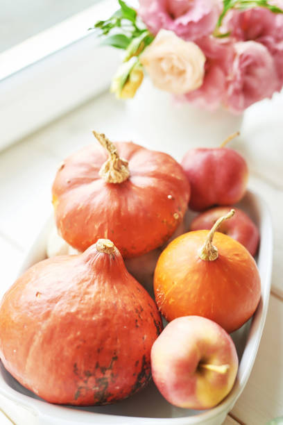 Autumn pumpkins and flowers.