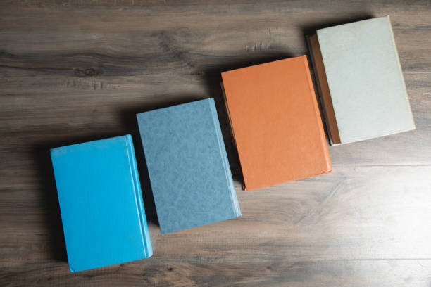 istock a pile of books on the table. 2198855735