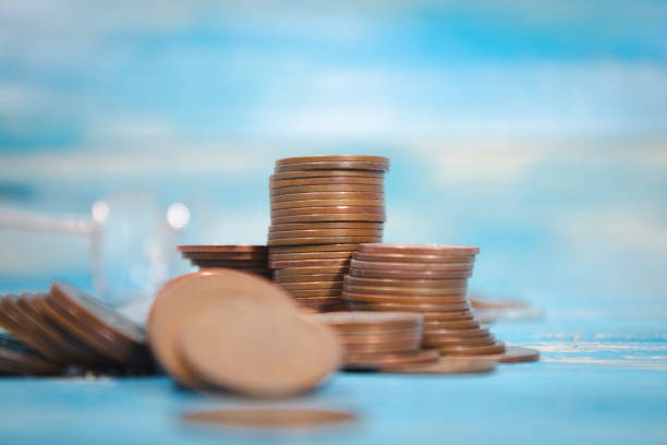 a pile of coins on the table