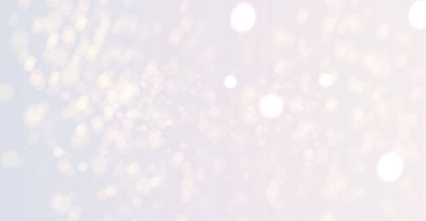 istock Christmas glowing dust background, the light of gold dust, bokeh light effect background, Yellow flickering glow with confetti bokeh light and particle motion. The dust sparks and golden stars shine. 2198863797
