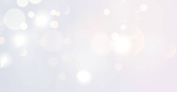 istock Christmas glowing dust background, the light of gold dust, bokeh light effect background, Yellow flickering glow with confetti bokeh light and particle motion. The dust sparks and golden stars shine. 2198864848