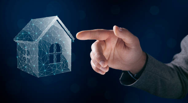 istock home from the net. illustrated house. man tapping on the screen 2198865131