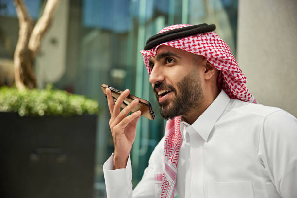 istock Young Saudi professional using phone outdoors 2198869323