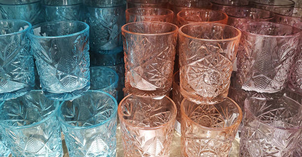 istock Set of crystal multicolored drink glasses. 2198870867