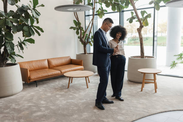 istock Business professionals collaborating in modern office 2198872171