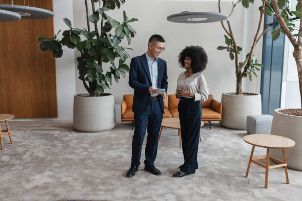 istock Professional duo discussing insights on laptop 2198872232