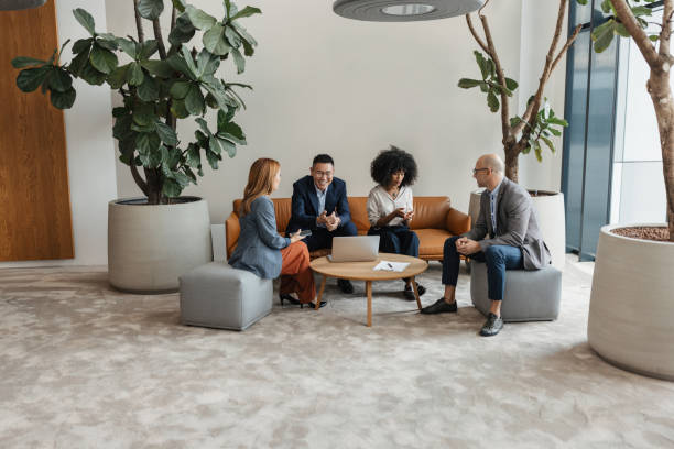 istock Business team collaborating in informal meeting 2198872728
