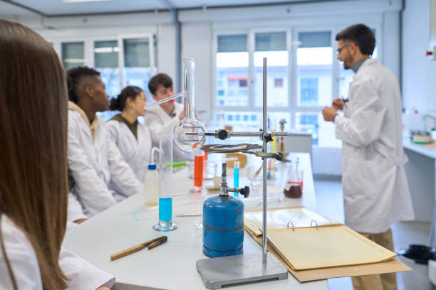 istock High school students following chemistry lesson in laboratory 2198875163