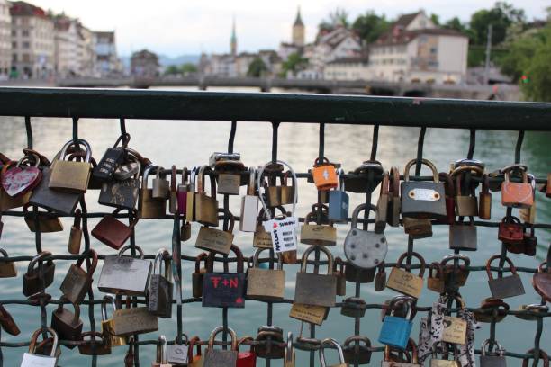 istock Love locks on a Zurich bridge with city view. 2198875304